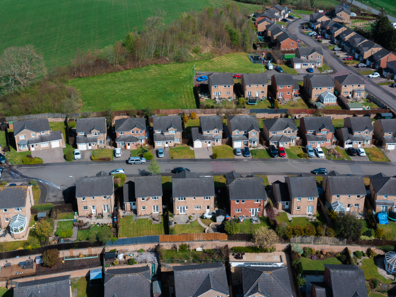 Aerial drone view of residential properties across Sussex covered by Damp Doctor Sussex